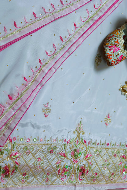 Unstitched Natural Crepe Suit With Handwork And Aariwork On Ghera