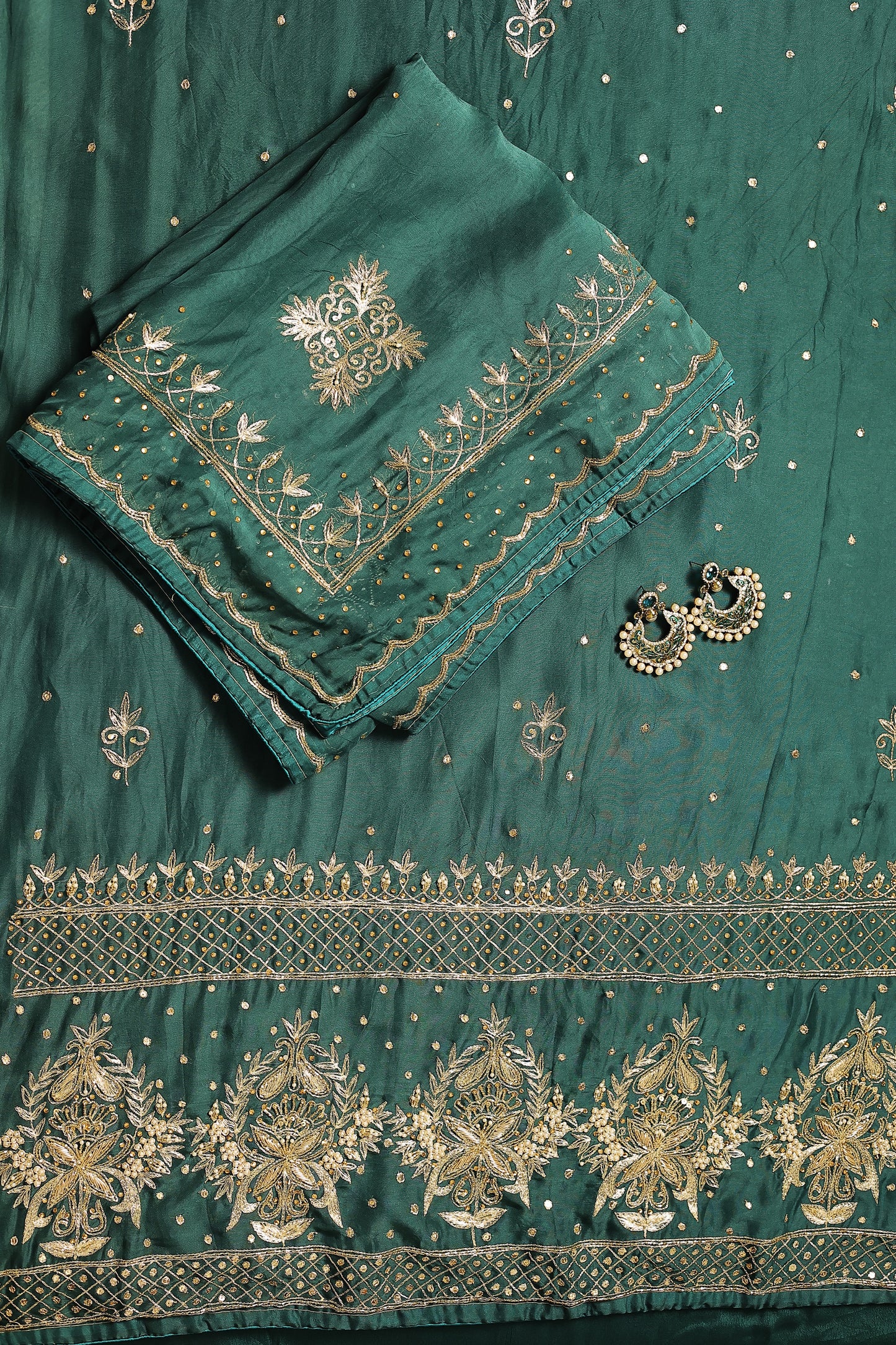 Unstitched Aari,Dabka And Pearl Work On Suit Front And Sleeves